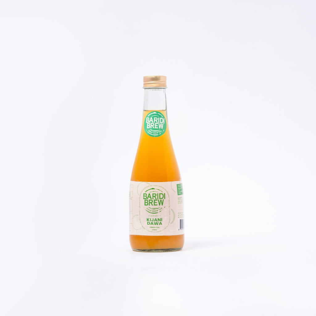 A bottle showing Kijani dawa, a Cold Pressed Tea in Kenya, product of Baridi Brew with a clear white background.